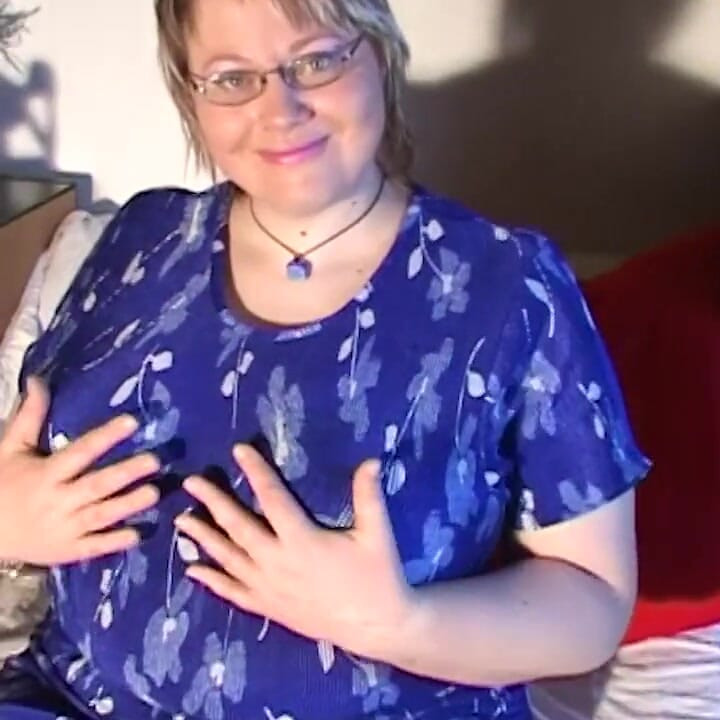 Horny BBW mature plays with her extreme monster tits