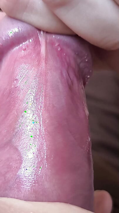 Close up cock head slow edging