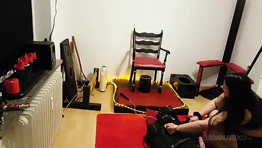 Curvy Brunette Dominatrix Commands Bound Slave in Fetish Dungeon