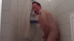 Montar consolador disparando esperma en la ducha