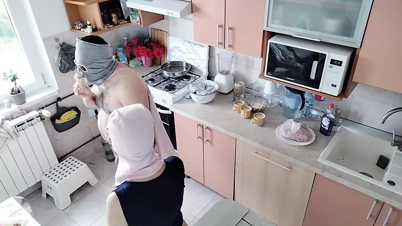 Hot amateur couple having fun in the kitchen.