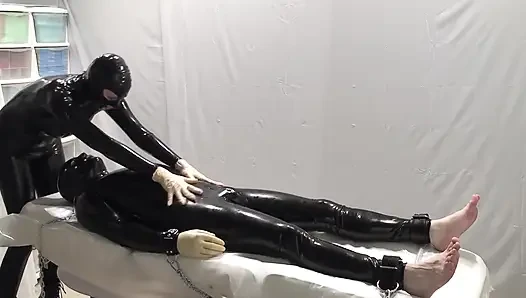 Mrs. Dominatrix and her experiments on a slave. 2 angle