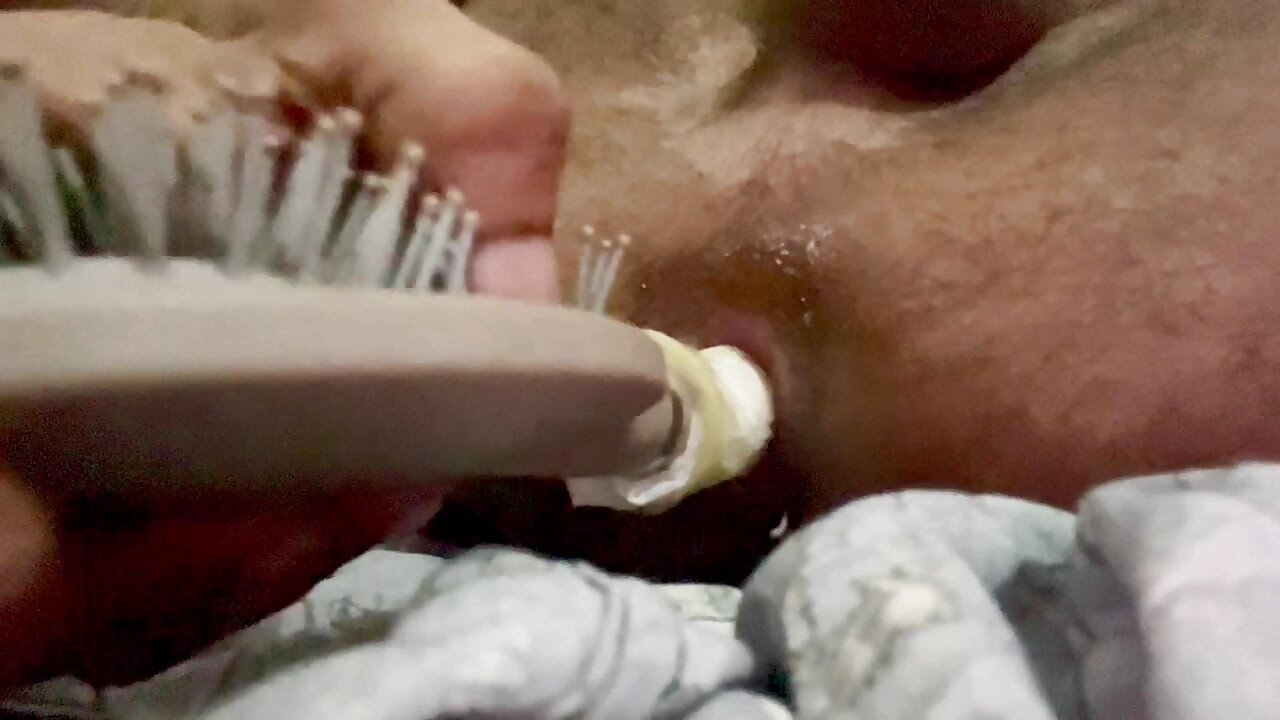 Anal play with hair brush