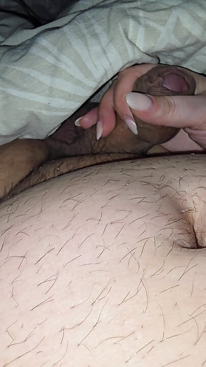 Step mom pulled out step son dick under blanket and handjob him hard