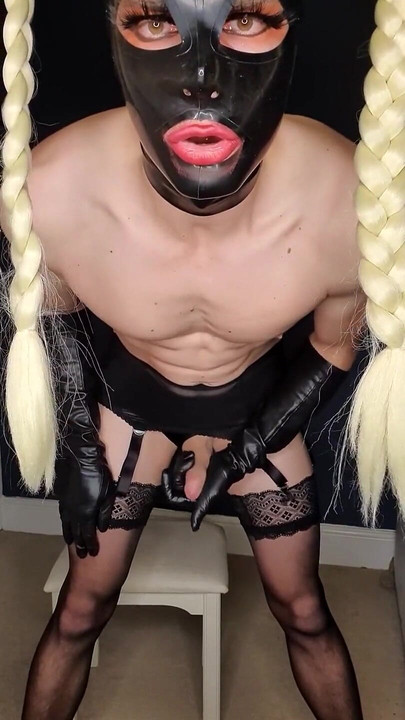 Dressed up in leather gloves and lingerie