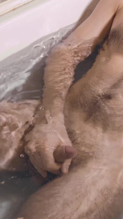 Memorable moment from "A young guy jerks off in the bath and if he holds back his moans during orgasm."