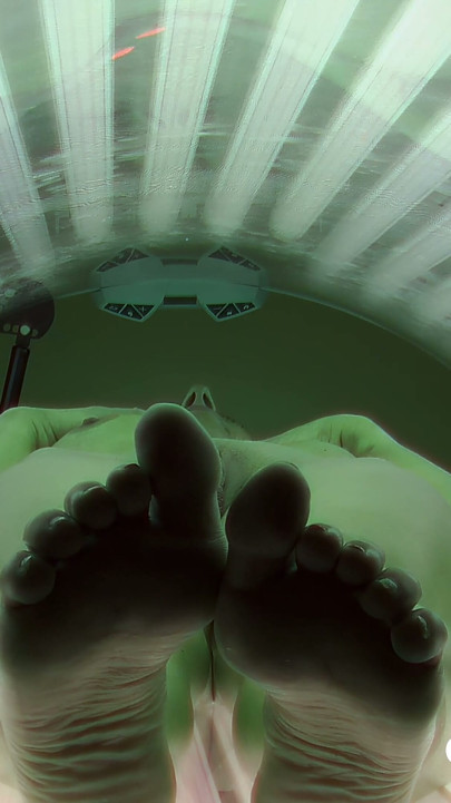 Czech Solarium 137: Silicone MILF Bares All in Solarium
