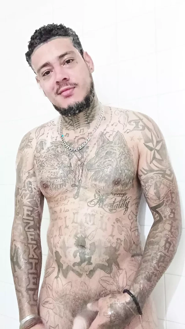 Sexy handsome Latino Colombian young man taking a shower showing ass and dick