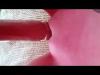 Fucking her pussy with dildo