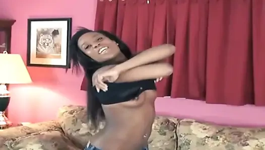 Seductive Ebony Babe Strips Naked on Couch Teasing Pussy