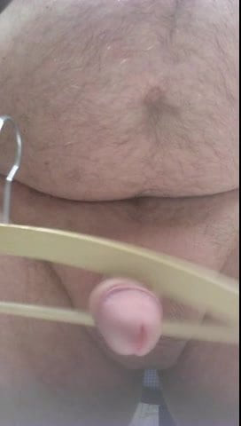 with clothes hanger cumshot