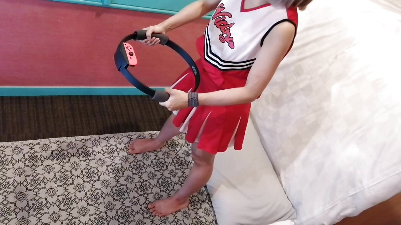 A cute, busty married woman does exercise 3 in a sexy cheerleader costume. Peeking down from above. Home made amateur Private Shoot