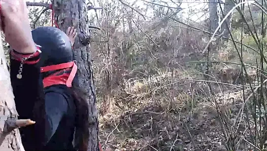 Outdoor sex in the wood. Wearing sexy clothes and high heels, bound, throated and fucked