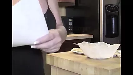 Step Mom seduces in the kitchen with her tits