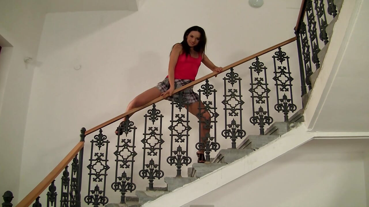 Petite French doll rides dick on the classy red sofa