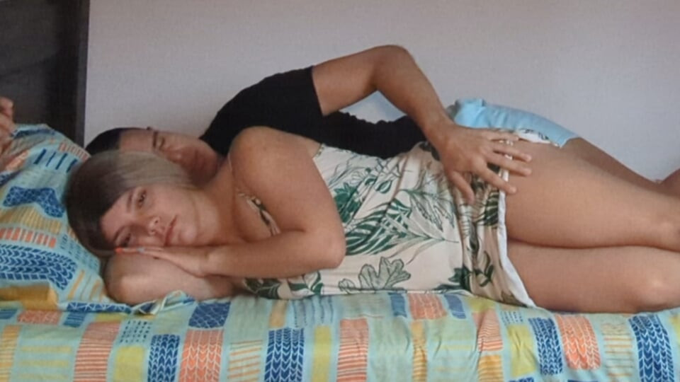 Stepson is accompanied by his stepmother to share a bed during a storm