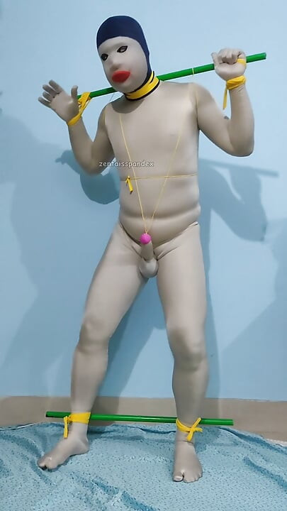 Zentai CBT penis tie walking slave