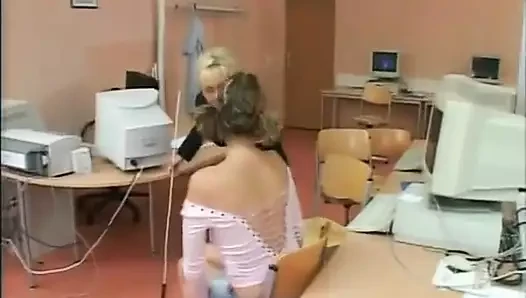 Scandalous teacher and student fuck in a threesome in the computer room