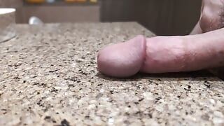 Slapping dick on the counter in slow motion