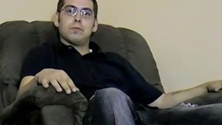 Nerdy amateur with glasses strips to jerk off until he cums
