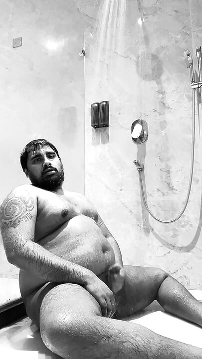 Young bear masturbates while showering