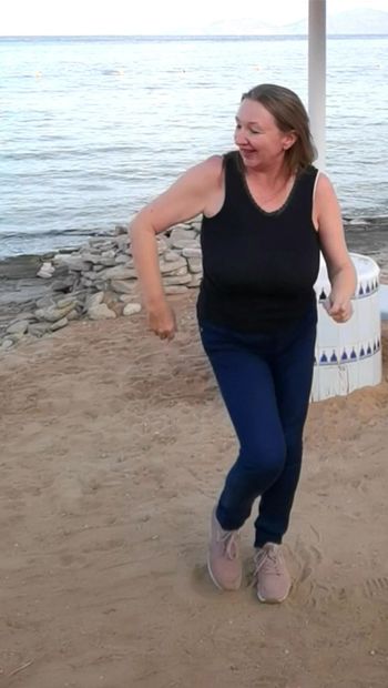 Granny active on the beach