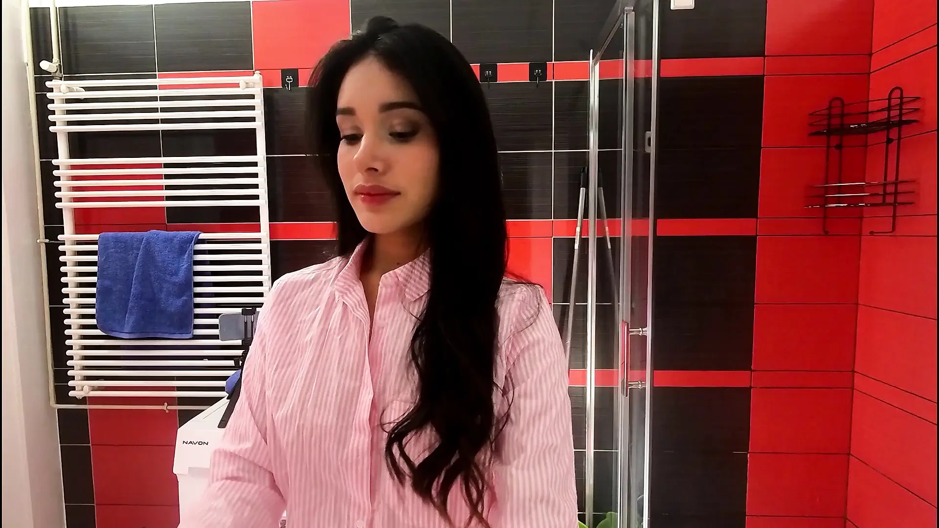 Hot petite brunette babe in the bathroom prepares for a night out in panties and a shirt