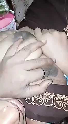 Pressing very hard on my aunt's boobs