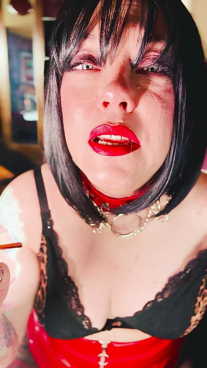 A Stunning Brit Smokes A Cigarette Using A Holder - Tina Snua Smoking Smoker Leather Bra