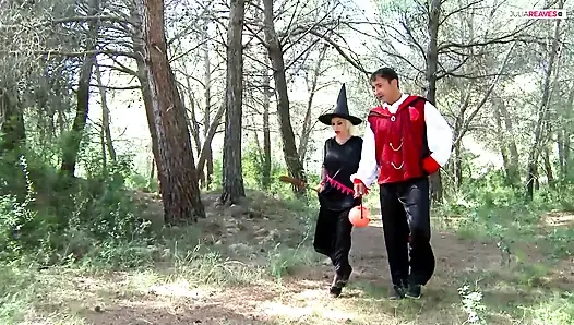 Big tits MILF sucks a huge cock while another thrusts her pussy in the wild