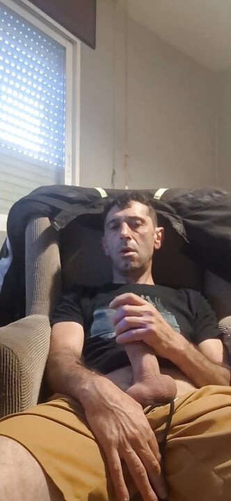 Guy masturbating on the sofa