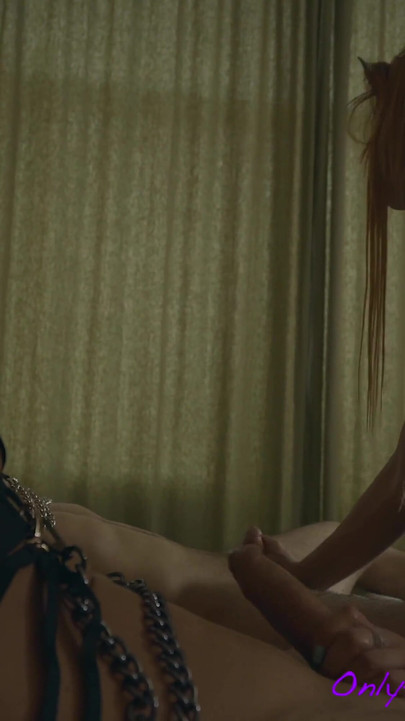 Two slaves are pleasing their mistress