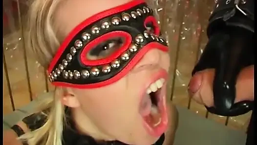 Dirty slave in fetish leather fucked by a sex toy