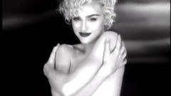Madonna topless but hiding her tits