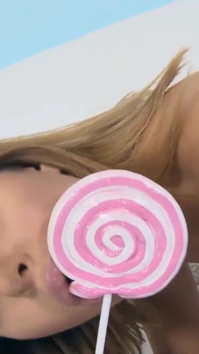 Marvelous blonde with perfect body touches her cunt with sweet candy