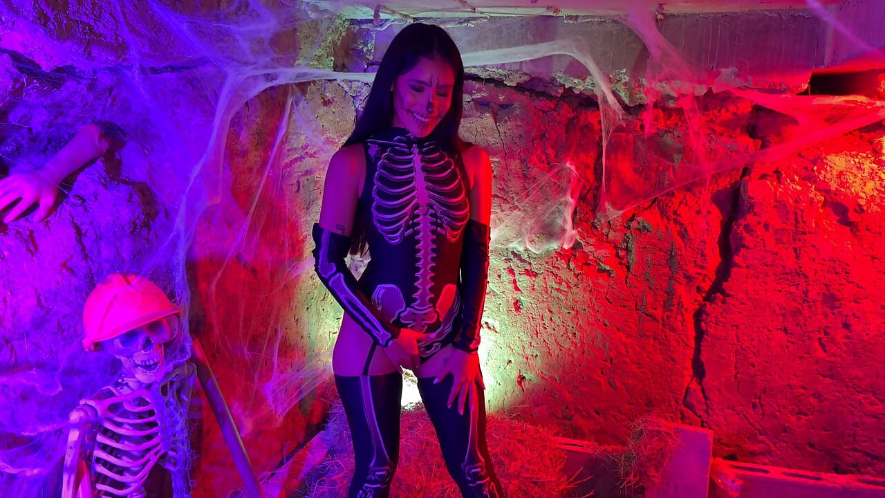 Petite Colombian woman gets aroused upon seeing a skeleton on Halloween night - Carolina Guerrero