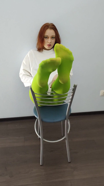 Redhead Teen Feeling Horny in Green Tights on Chair