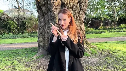 Liz Rainbow Smoking a Flor De Oliva Cigar Outdoors