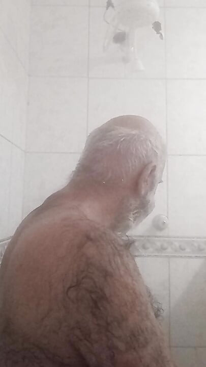 HAIRY BRUTE TAKING A SHOWER