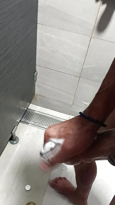 Handjob at work in the shower quickly