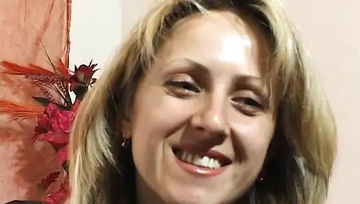 Busty blonde showing her body