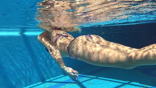 Absolutely astonishing blonde pornstar Mary Kalisy swimming