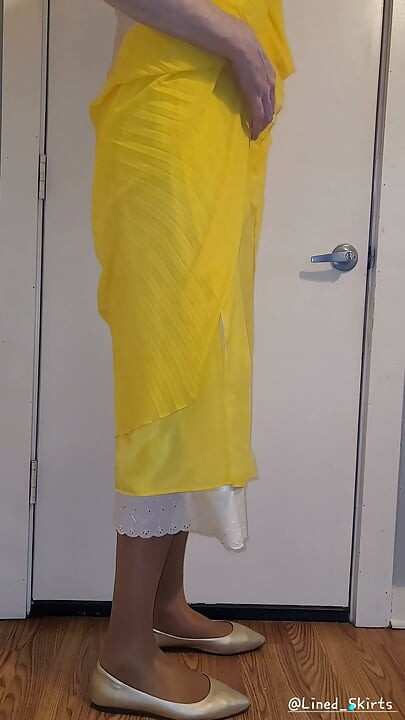 Yellow chiffon skirt with a satin half slip