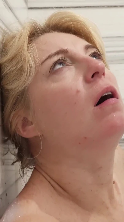 Soapy stepmom fingering her holes