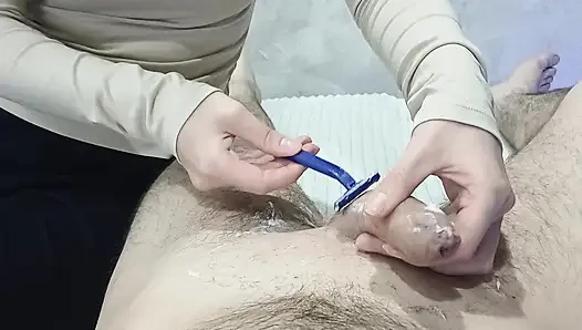 The stepdaughter shaved her stepfather's penis and gave him an oily handjob with a ruined orgasm.