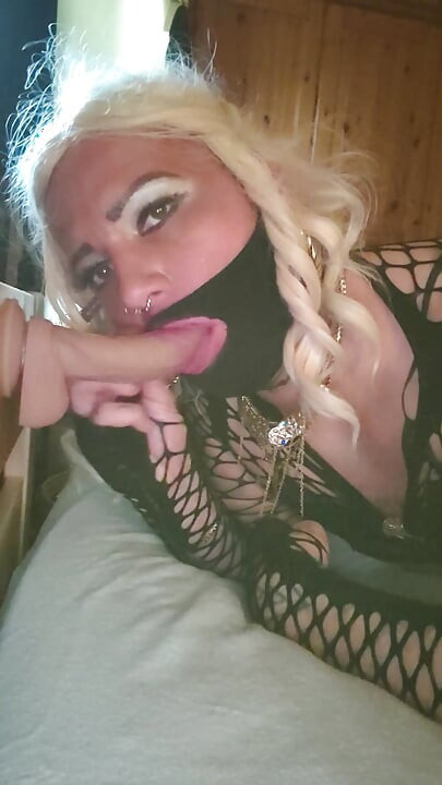 Blonde Sissy Crossdresser sucking dildo
