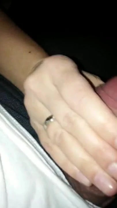 Touching his cock in a bar