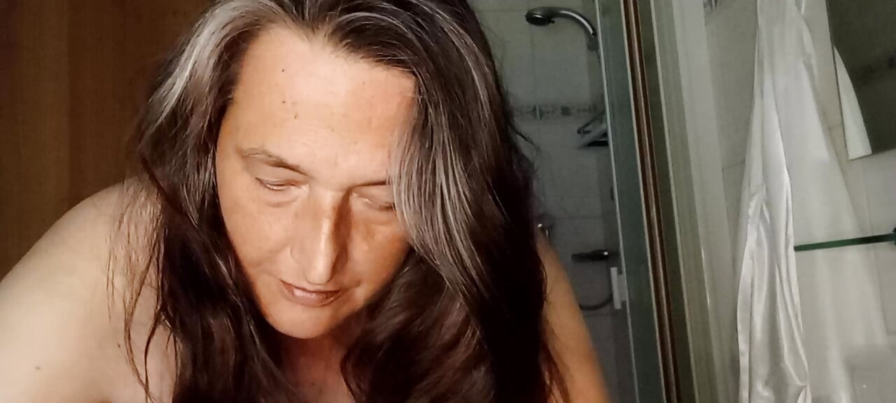 52-year-old chubby plays with her natural tits before showering - Will you come along?