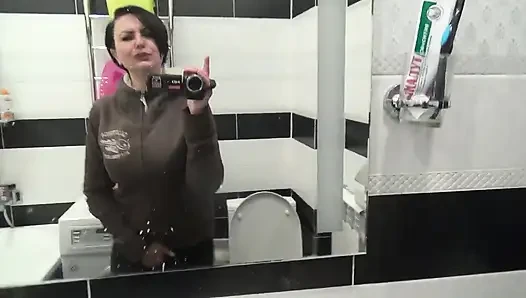 Pissing on the toilet long and a lot after long desperation and a lot of liquids