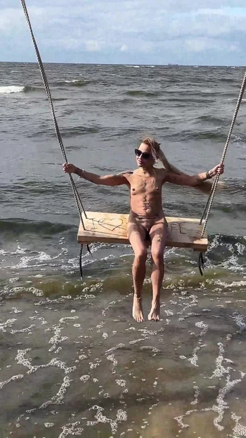 Key moment from "Beauty blonde walking naked on the seashore"